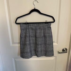Woman’s plaid skirt